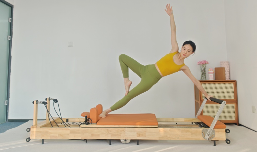 Fällbar träkroppsbalans Pilates Core Bed Reformator