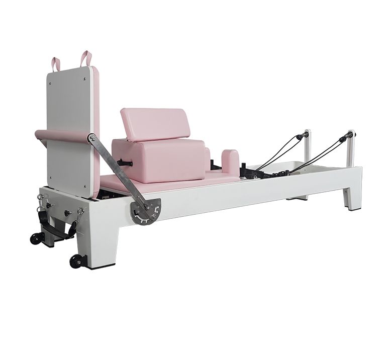 Vit målad ekrosa pilates utrustning