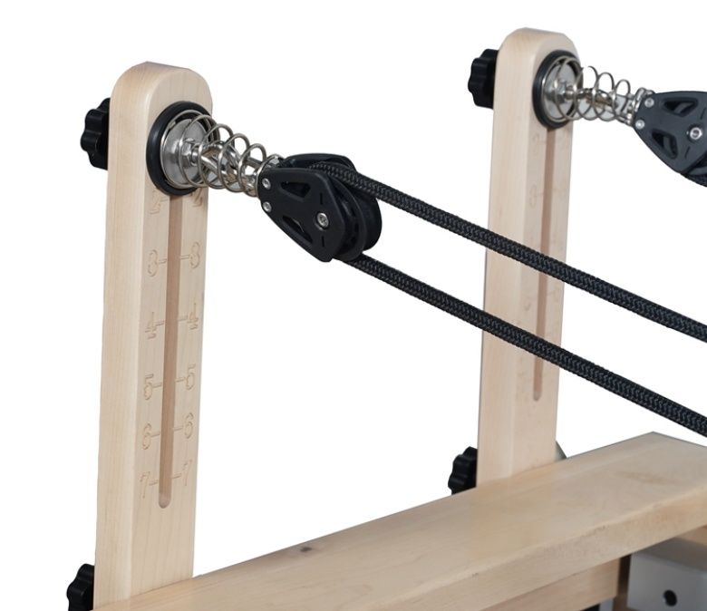 Foldbar Pilates träningsmaskin med träben