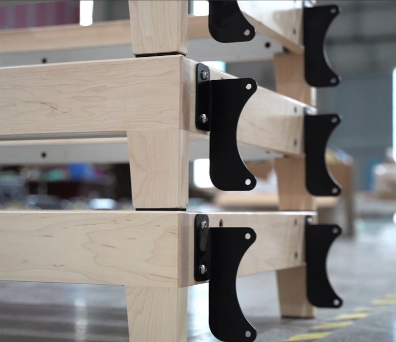 Foldbar Pilates träningsmaskin med träben