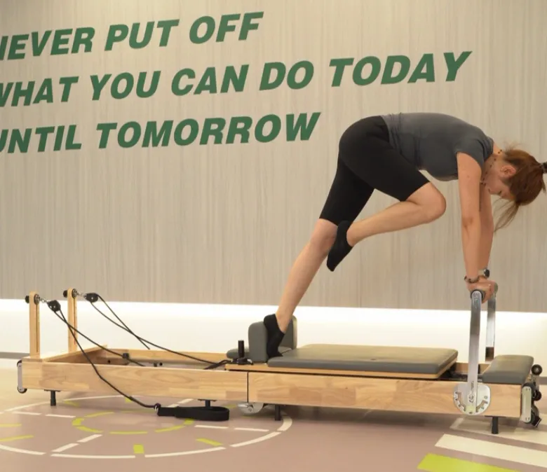 Fällbar träkroppsbalans Pilates Core Bed Reformator
